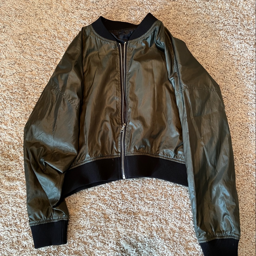 Olive bomber jacket with black lining